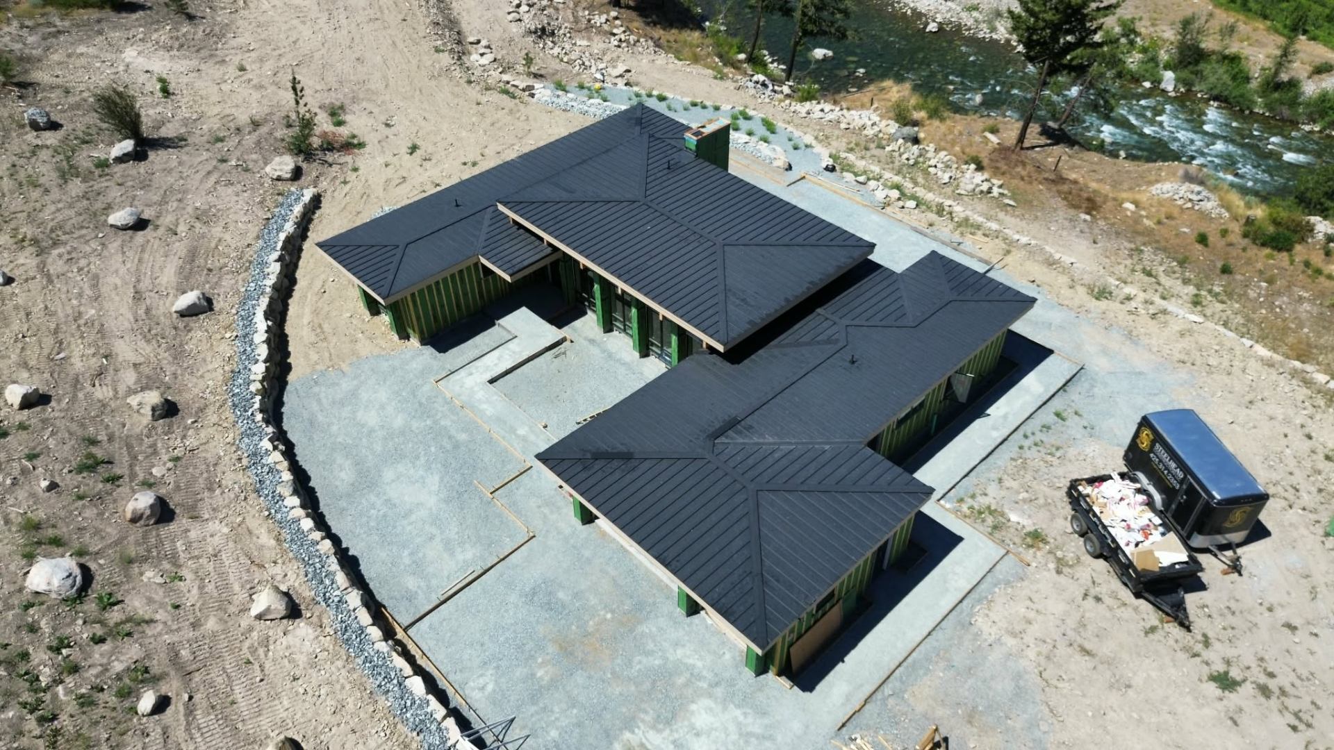 Standing seam metal roof installed by Empire Roofing Systems on a home overlooking the Wenatchee River in East Wenatchee, WA
